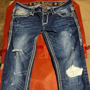 Distressed Blue Jeans with White Stitching
